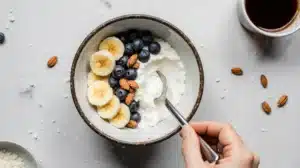 Good Culture Cottage Cheese: The Clean, High-Protein Upgrade Your Fridge Needs 9 Stirring Good Culture cottage cheese with berries and almonds