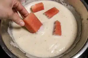 Watermelon pieces coated in batter for fried watermelon recipe