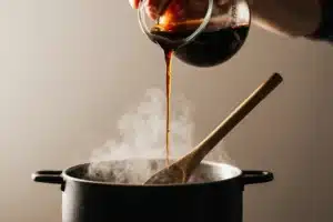 Authentic Omakase Sauce Recipe | Easy Japanese Sushi Sauce 5 Small saucepan with omakase sauce being prepared