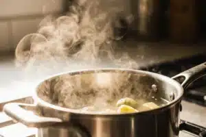 Quick Pickle Recipe: Ready in 30 Minutes with Crunchy Flavor 5 Brine simmering in a saucepan for quick pickle recipe