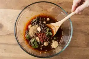 How to Make moe's adobo chicken: The Perfect Copycat Recipe for Authentic Flavor 9 Mixing marinade ingredients for moe's adobo chicken in a glass bowl