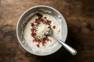 Bacon & Cream Cheese Stuffed Doritos Recipe 12 Mixing cream cheese and bacon filling for stuffed doritos chicken