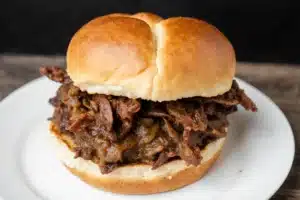 Ultimate Brisket Sandwich Recipe: How to Make the Best Leftover & Smoked Brisket Sandwich 16 Pressed top bun brisket sandwich