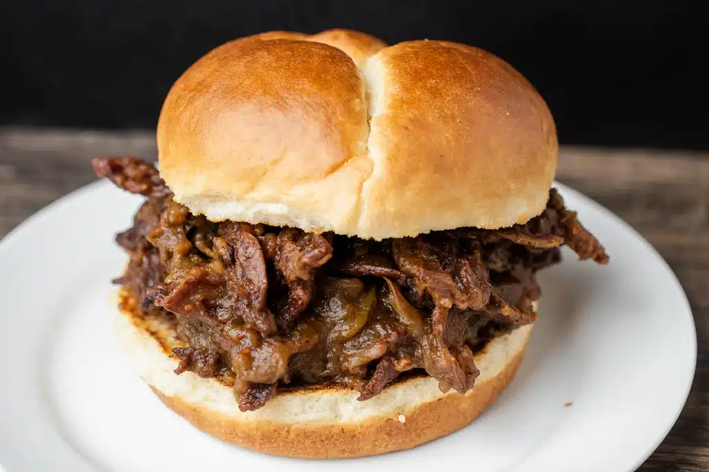 Ultimate Brisket Sandwich Recipe: How to Make the Best Leftover & Smoked Brisket Sandwich 7 Pressed top bun brisket sandwich