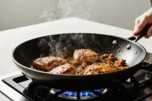 How to Make moe's adobo chicken: The Perfect Copycat Recipe for Authentic Flavor 11 Searing moe's adobo chicken in a skillet