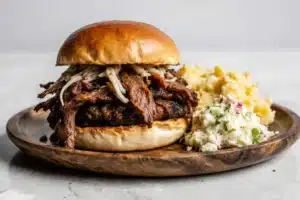 Ultimate Brisket Sandwich Recipe: How to Make the Best Leftover & Smoked Brisket Sandwich 17 Served brisket sandwich with sides