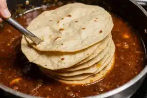 Chicken Birria Tacos: The Ultimate Recipe for Crispy, Juicy Flavor 14 Prepping tortillas for chicken birria tacos