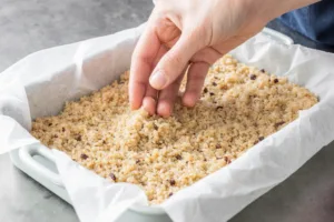 Step 8 Press Rice Base for Spicy Salmon Sushi Bake