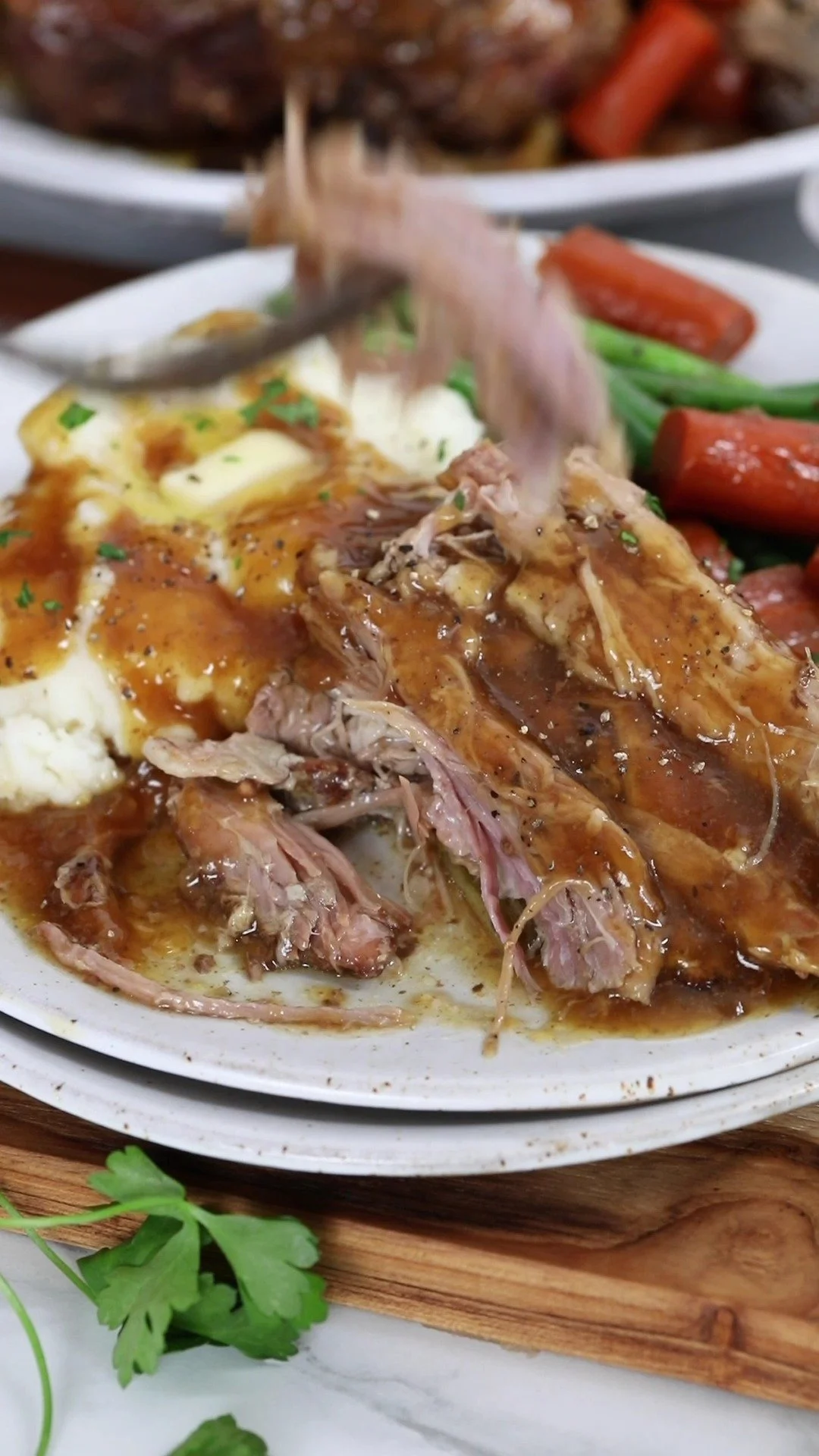 Crock Pot Pork Roast 1 Delicious Crock Pot pork roast ready to be served with sides.