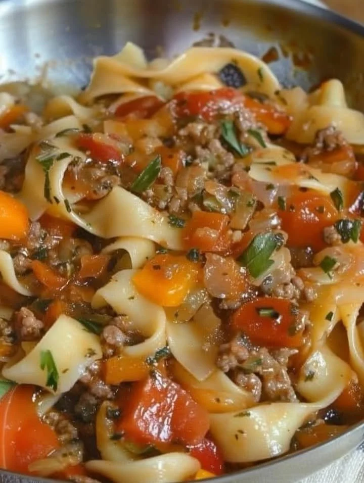 Italian Drunken Noodle Recipe 1 Plate of Italian Drunken Noodle garnished with fresh herbs and spices.