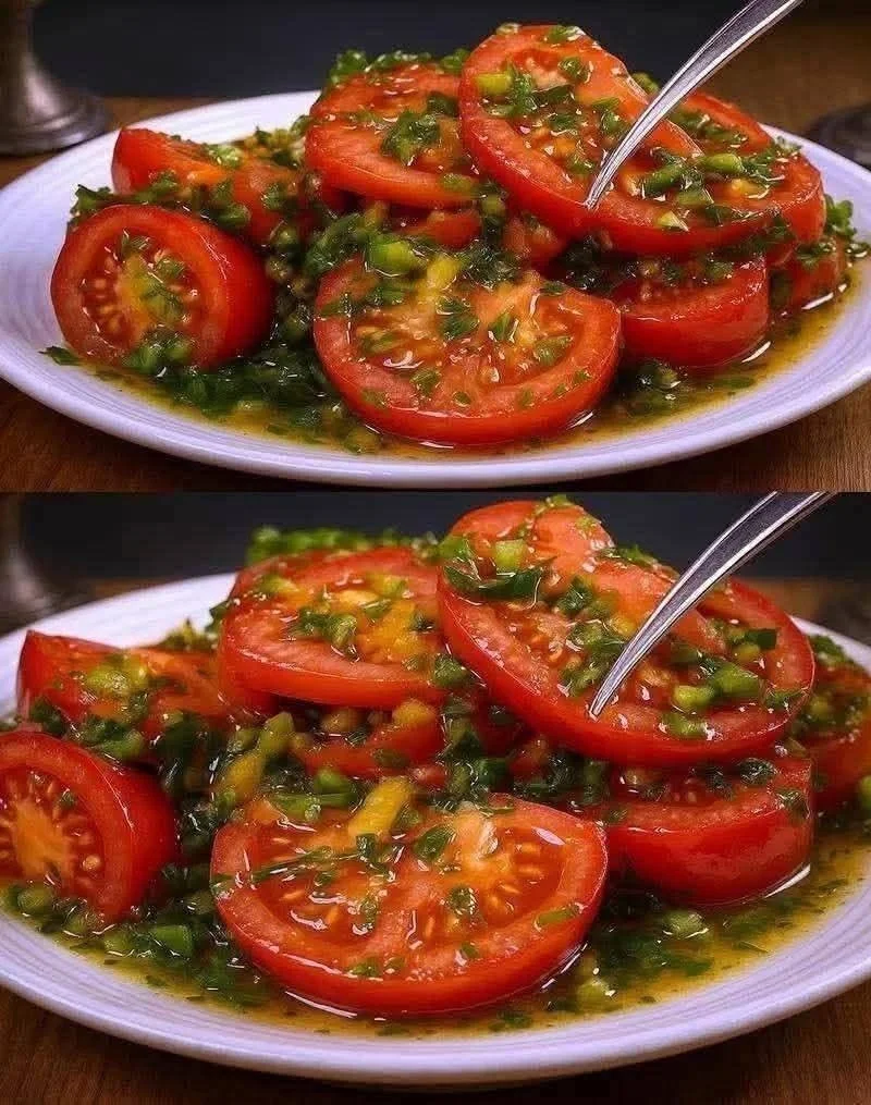 Magic Tomato Salad: Fresh Flavor in Every Bite 1 A vibrant bowl of Magic Tomato Salad with fresh ingredients and herbs.