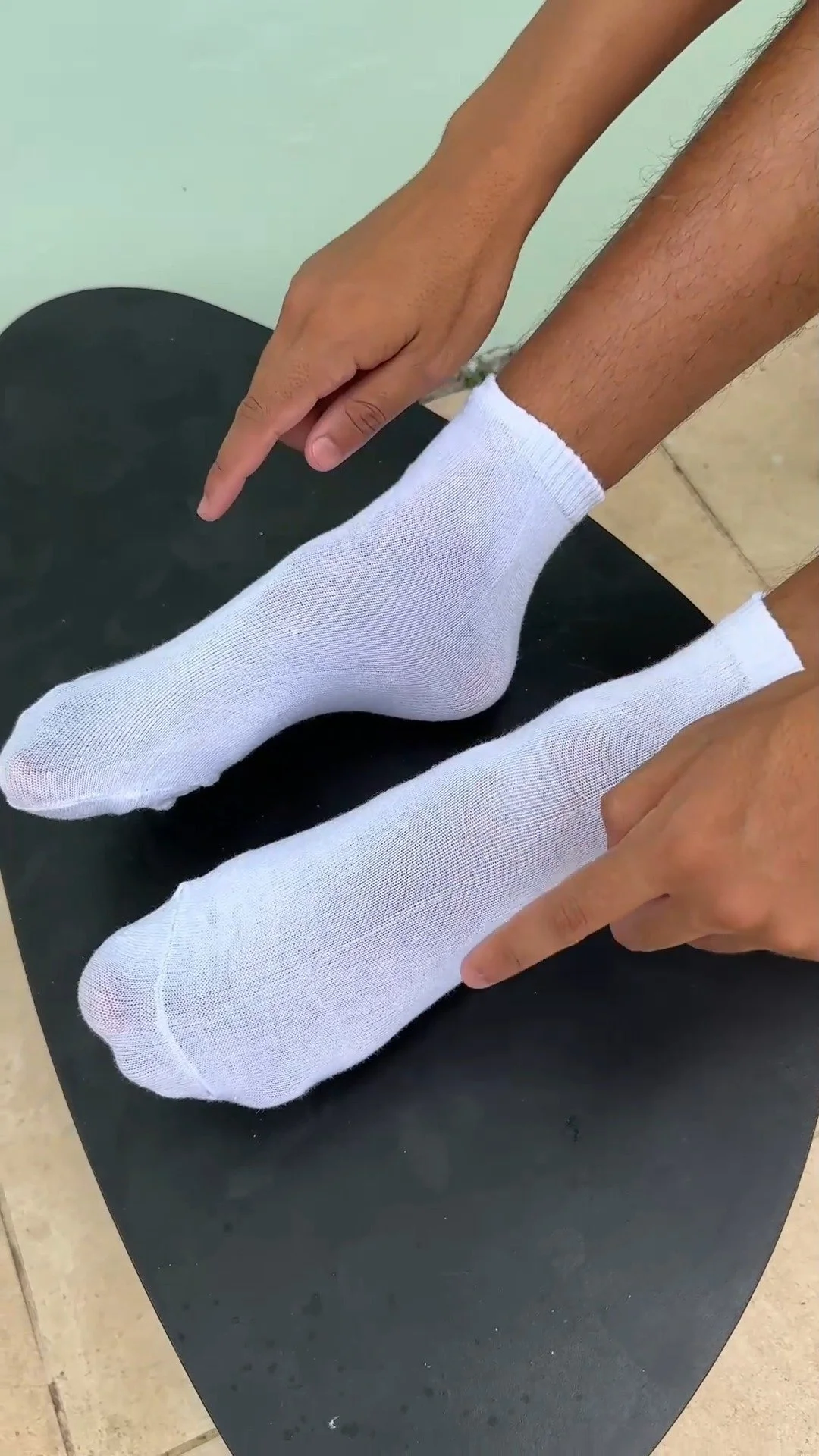 Sleeping with Socks On Can Save Your Life 1 Person sleeping soundly with cozy socks on to improve health and sleep quality.