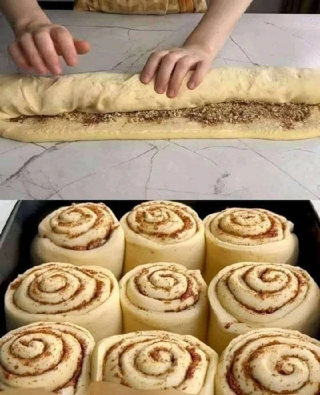 Soft Cinnamon-Walnut Rolls with Cream Cheese Frosting 1 Soft cinnamon-walnut rolls decorated with cream cheese frosting.
