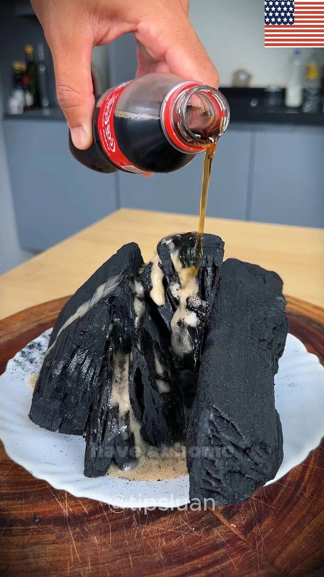 What Coca-Cola Does to Charcoal 1 Coca-Cola poured over charcoal, illustrating interaction and effects.