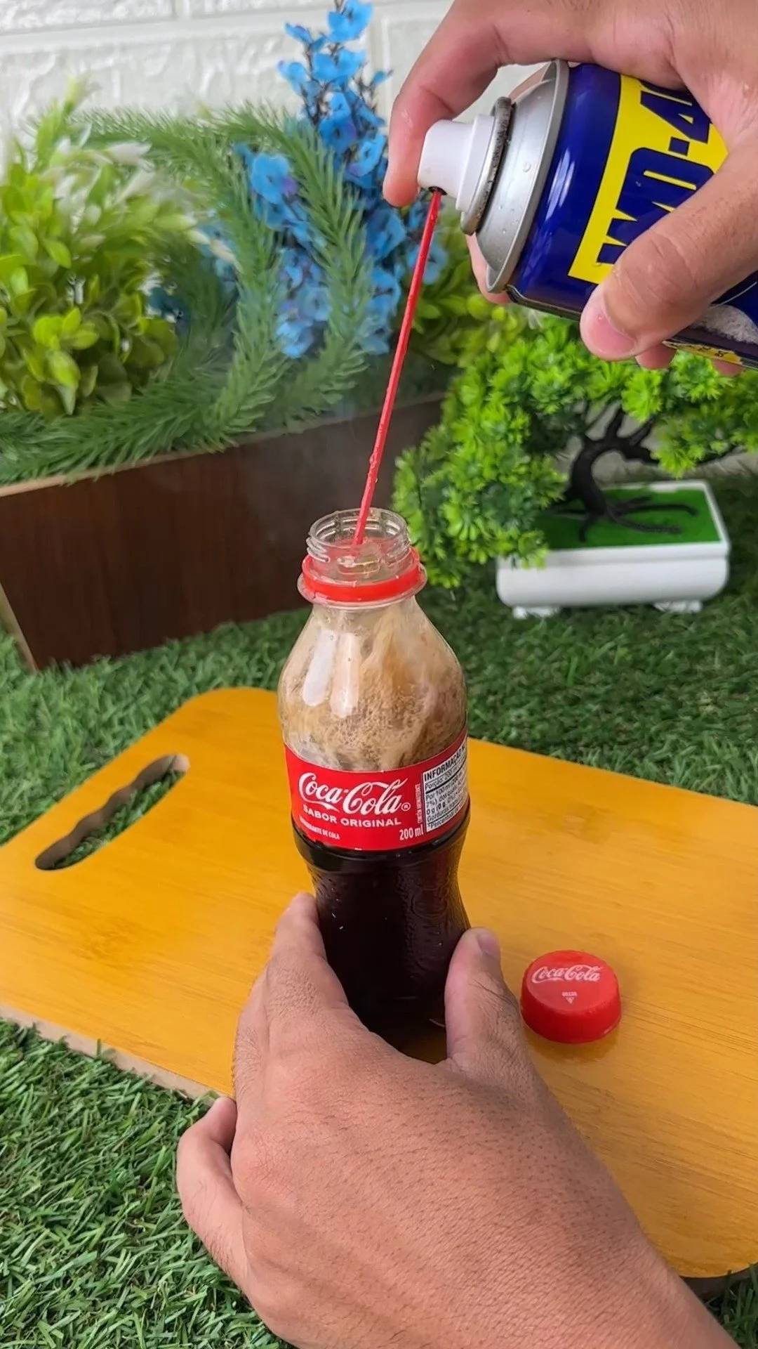 Why WD-40 in Coca-Cola Is a Bad Idea 1 A warning graphic about the dangers of mixing WD-40 and Coca-Cola.